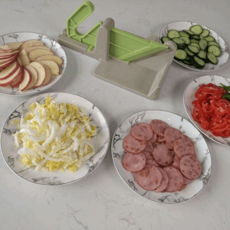 Hand push vegetable cutter