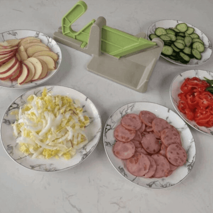 Hand push vegetable cutter