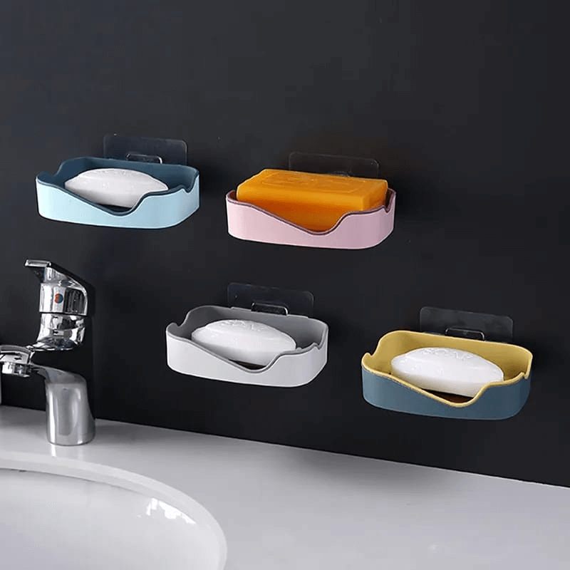 Self-adhesive wall-mounted soap dish