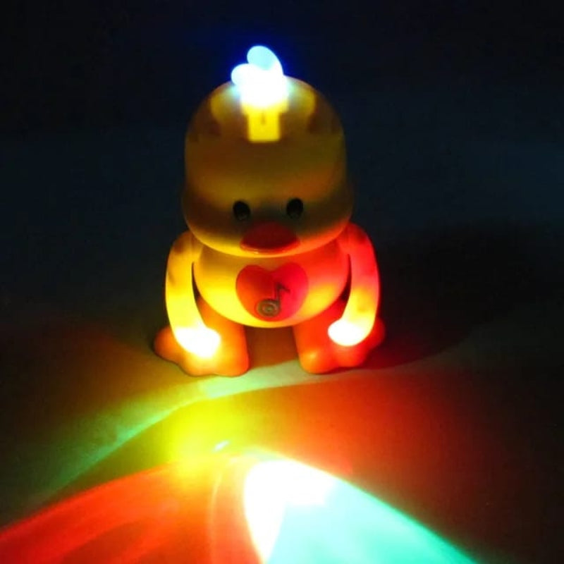 Battery operated dancing duck with light sounds.