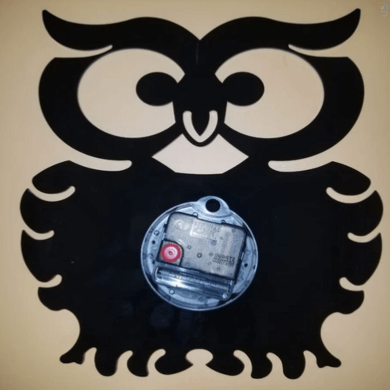 Owl shaped wall clock