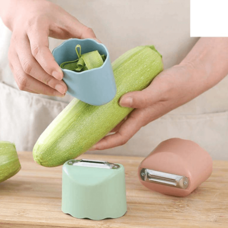 Anti splash fruit and vegetable peeler